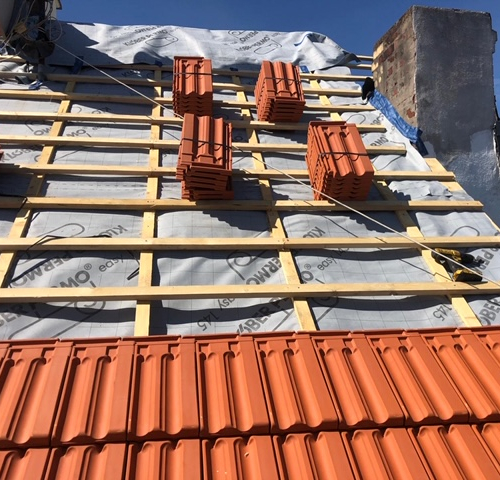 Dach und Fassade  an denkmalgeschütztes Altstadt-Objekt