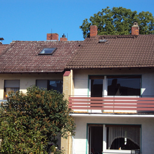 Dachreinigung und Beschichtung an 2 Doppelhaushälften in Anthrazit