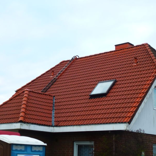 Sanierung eines Einfamilienhauses mit Krüppelwalmdach